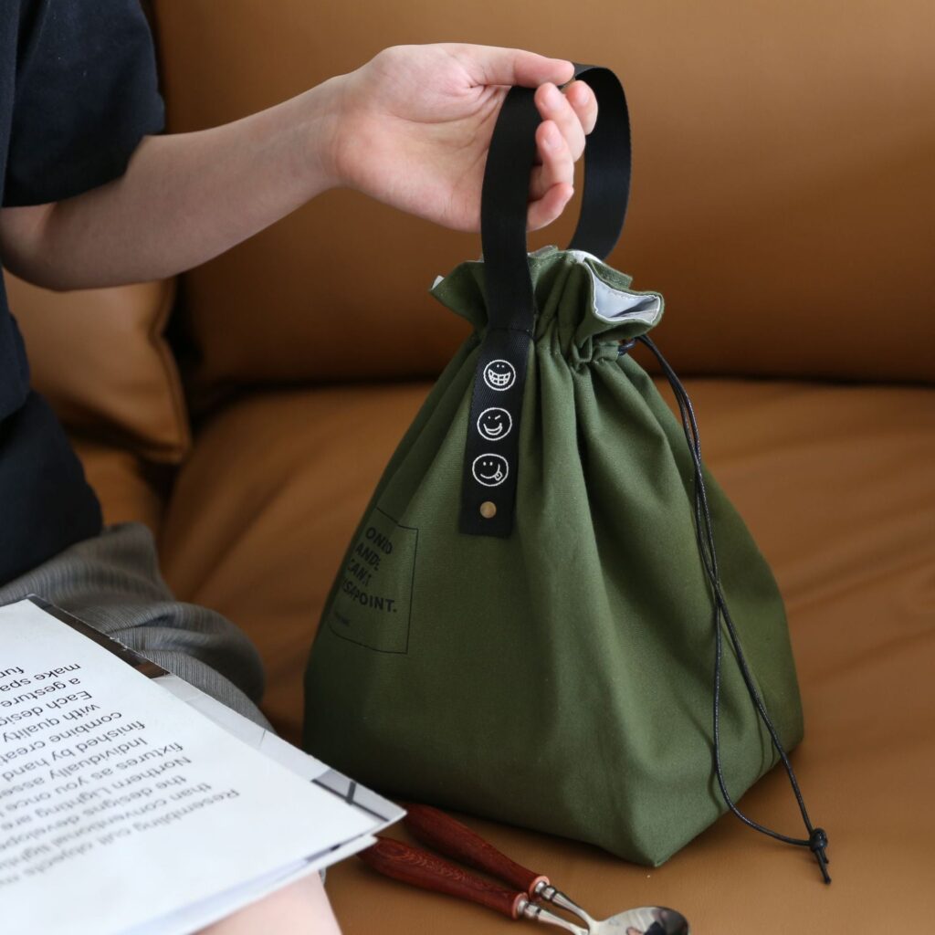 Sac à lunch chic en toile, format sac à dos avec poche avant