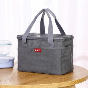 Sac isotherme chic en polyester, poignées rembourrées et poche avant